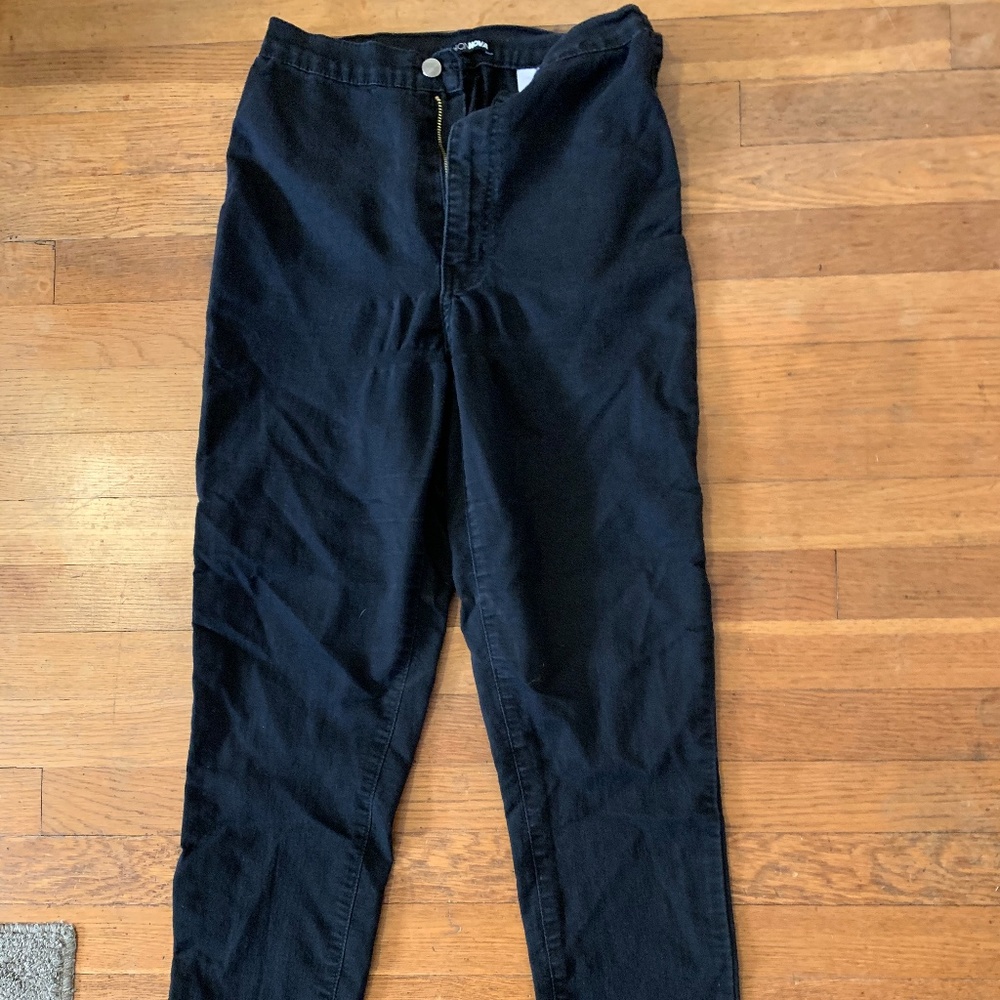 High-waisted black pants/jeans
